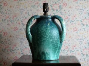 Matte glaze, three-handled lamp.
