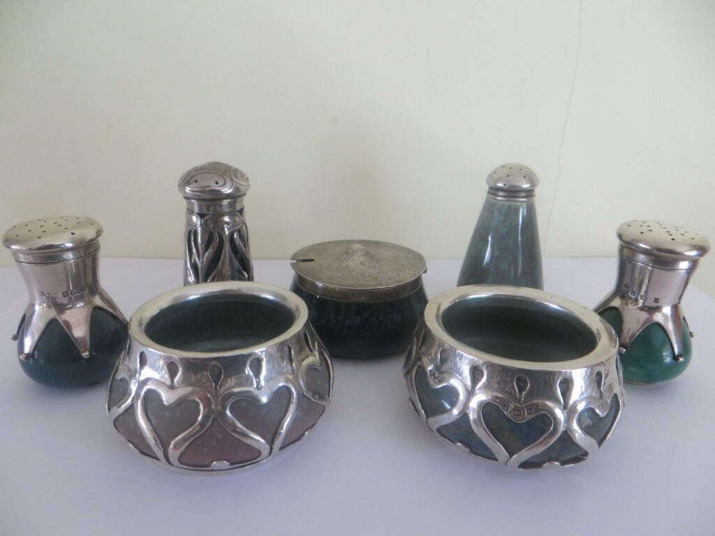 Liberty and Co 'cymric' range of smalls, incorporating Ruskin bodies circa 1900/1.