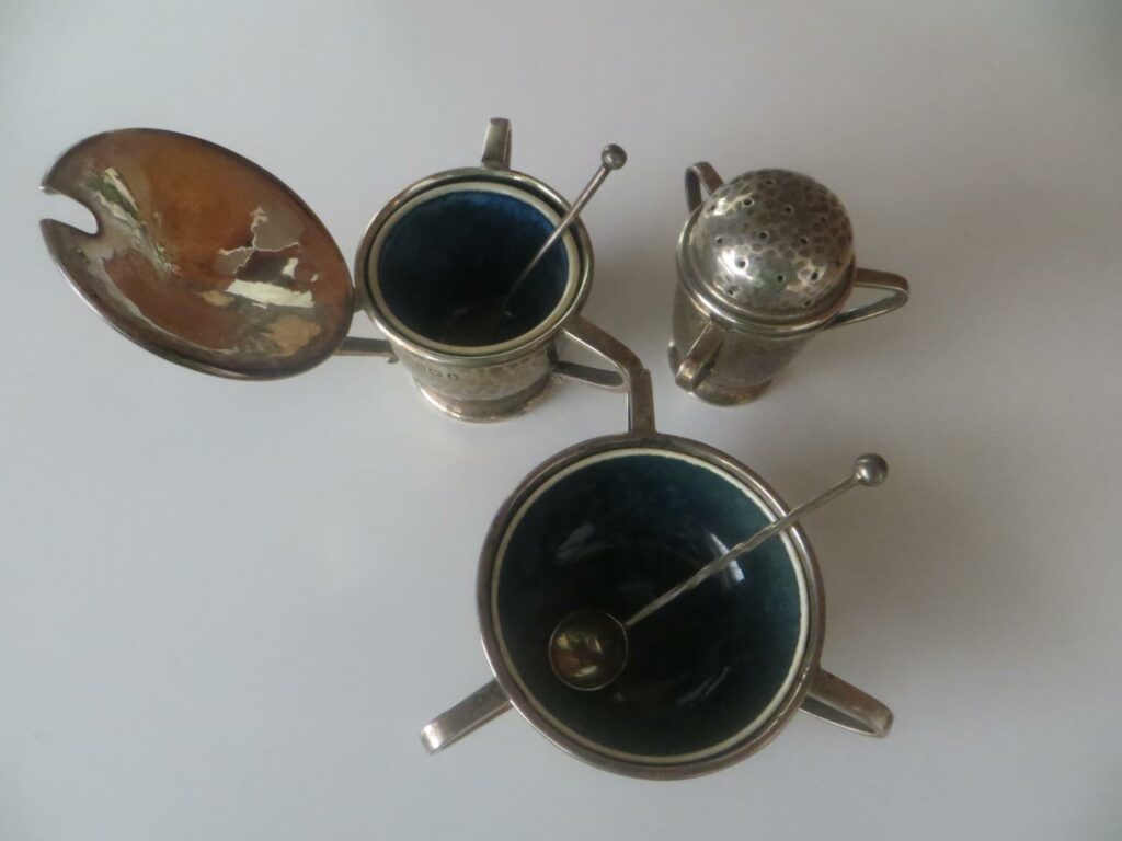 A. E. Jones cruet set with Ruskin liners.