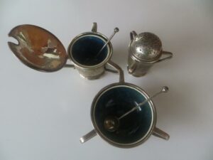 A. E. Jones cruet set with Ruskin liners.