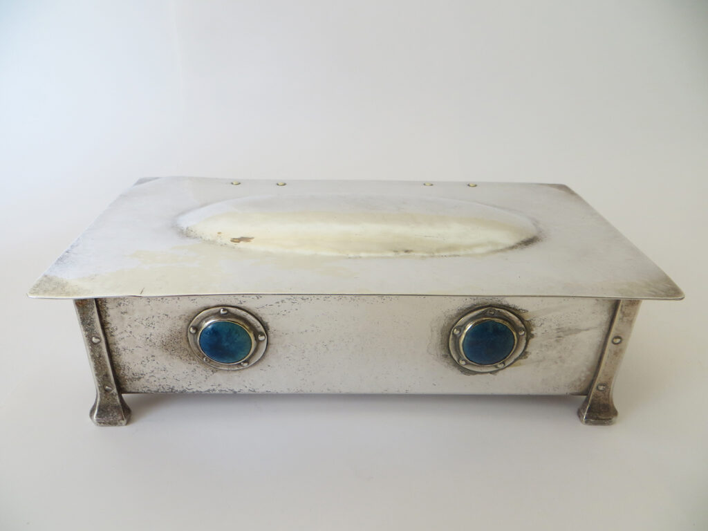 Former Jesson & Birkett design casket made by A. E. Jones.